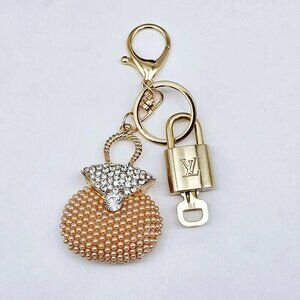 Authentic Louis Vuitton Lock & Key with unbranded Pearl Keycharm, Keychain